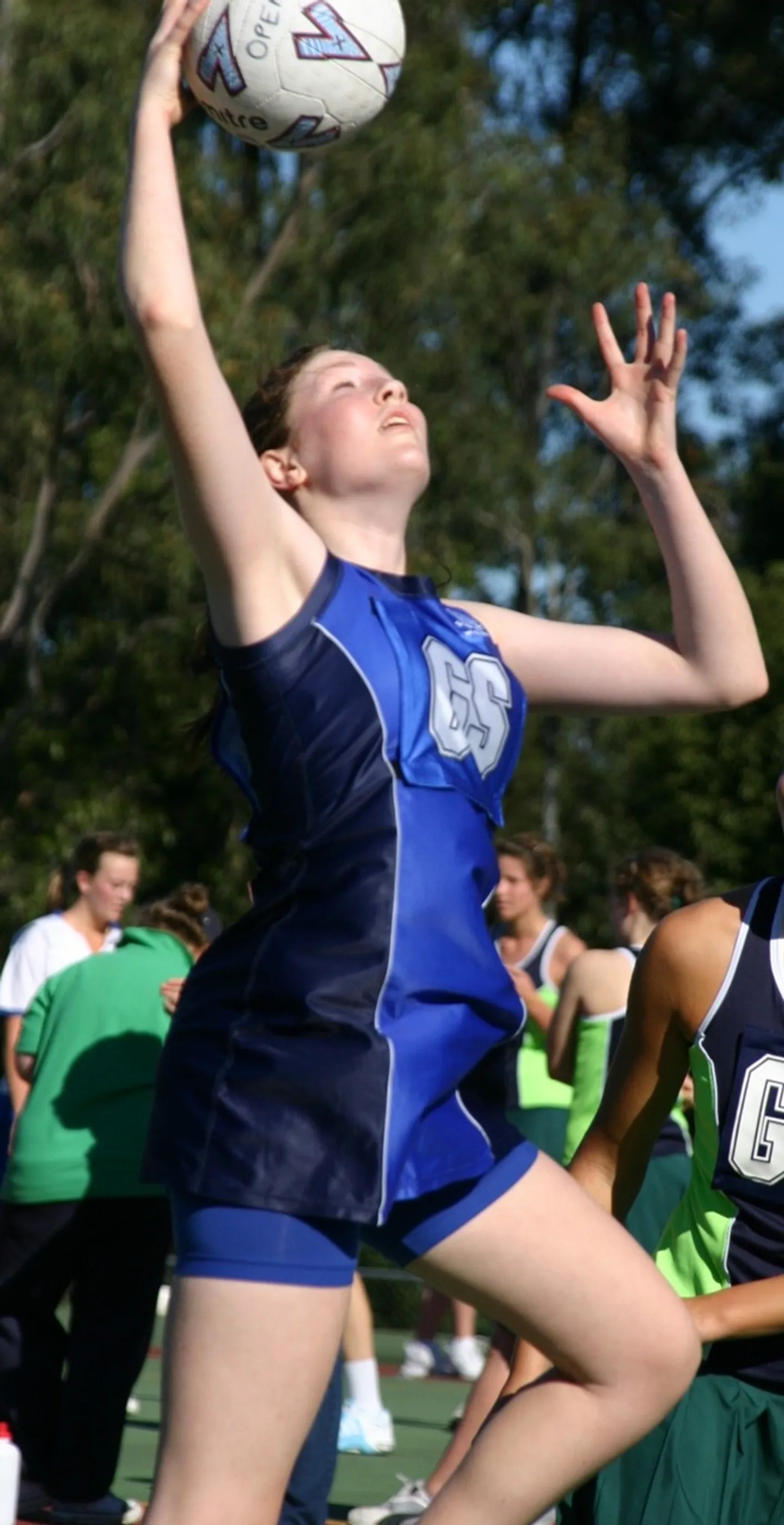 2006-michelle-geddes-with-cycle-pants-under-the-open-netball-dress