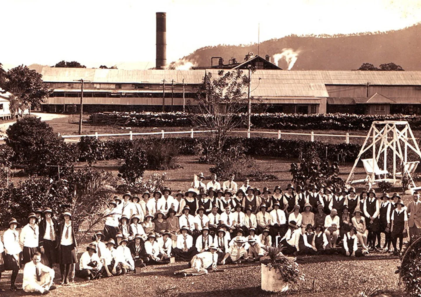 group-visiting-gordonvale-sugar-mill-tile