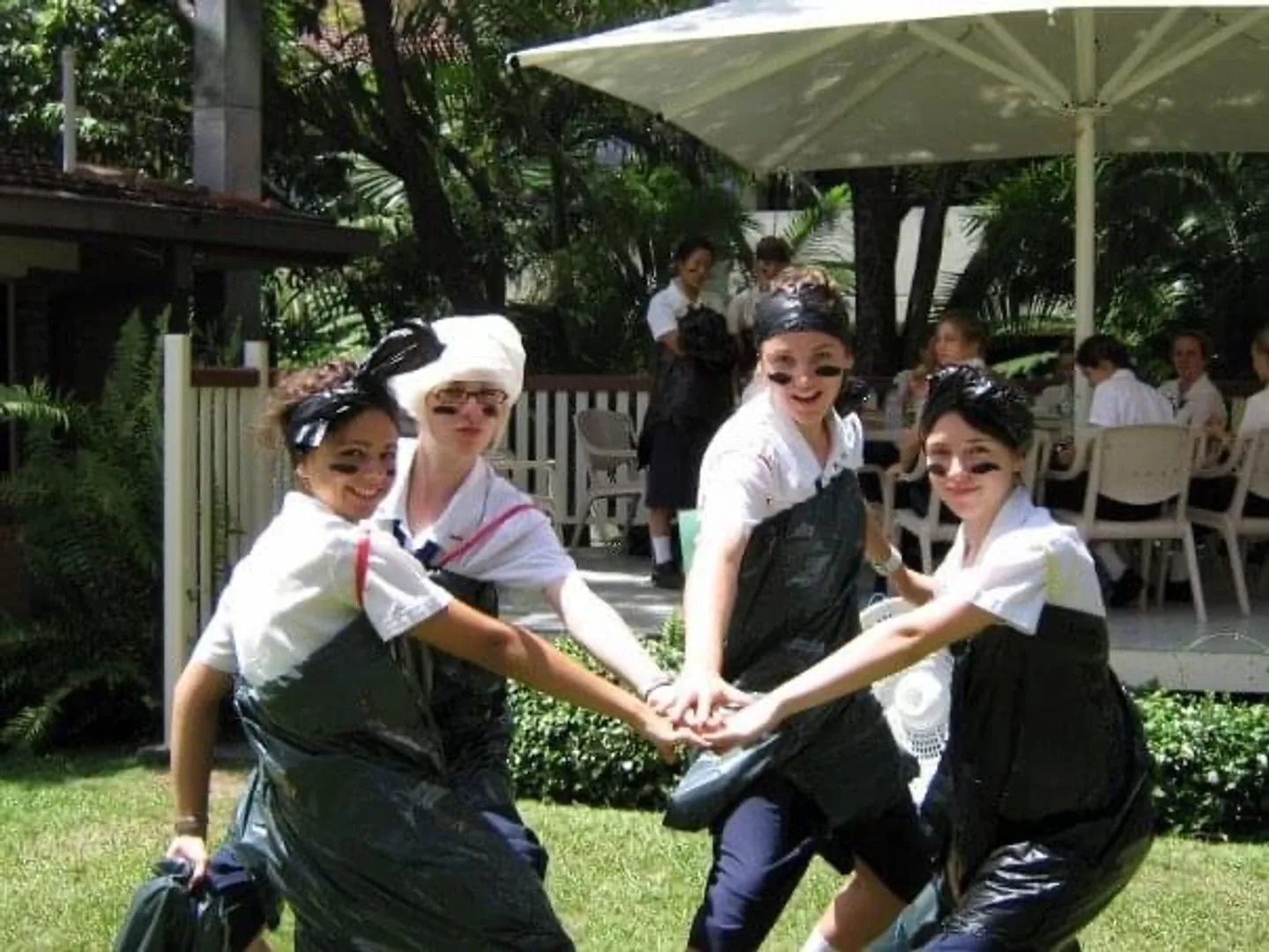 year-12-bggs-running-around-in-garbage-bags-to-promote-litter-collection